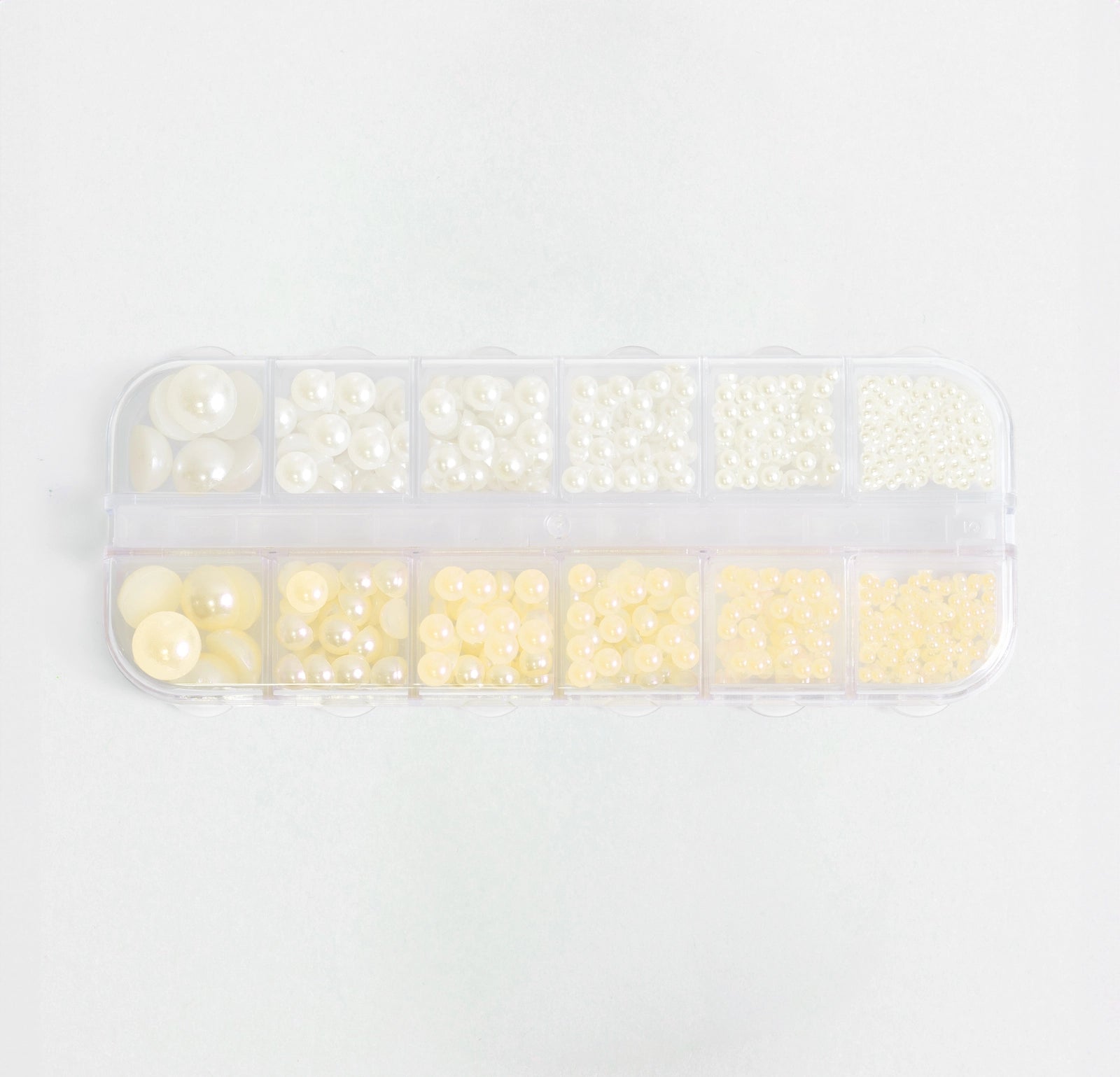 Set completo di perle bianco panna e giallo pastello per decorazioni unghie, in organizer.