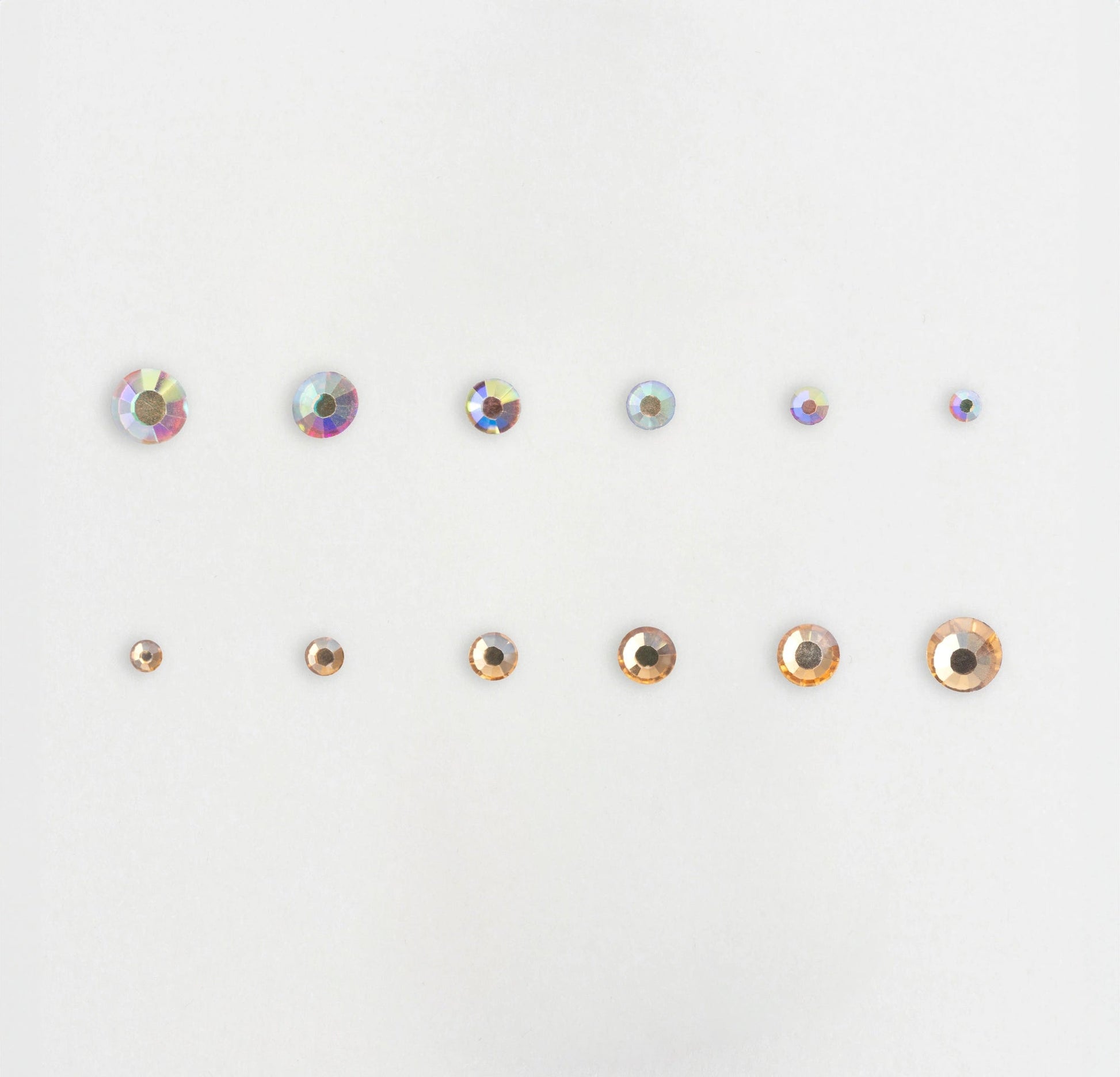 Strass olografici e champagne di varie dimensioni per nail art.